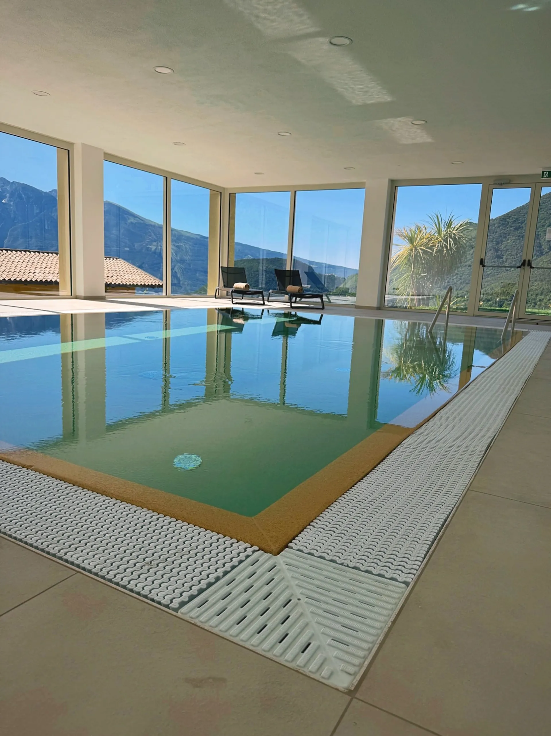 Indoor pool at Residence Sermerio overlooking Lake Garda